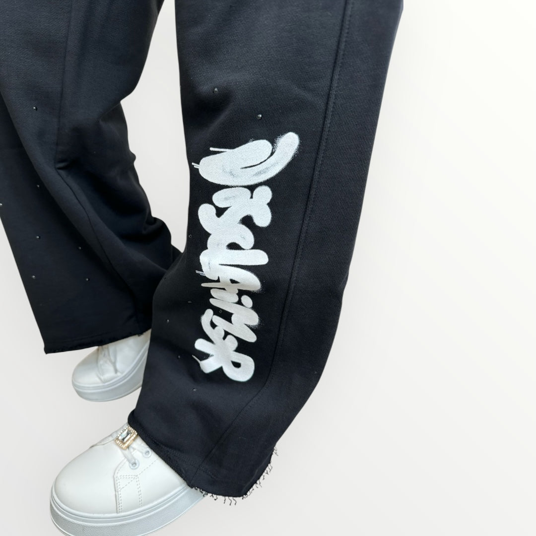 DISCLAIMER - PANTALONE CON LOGO