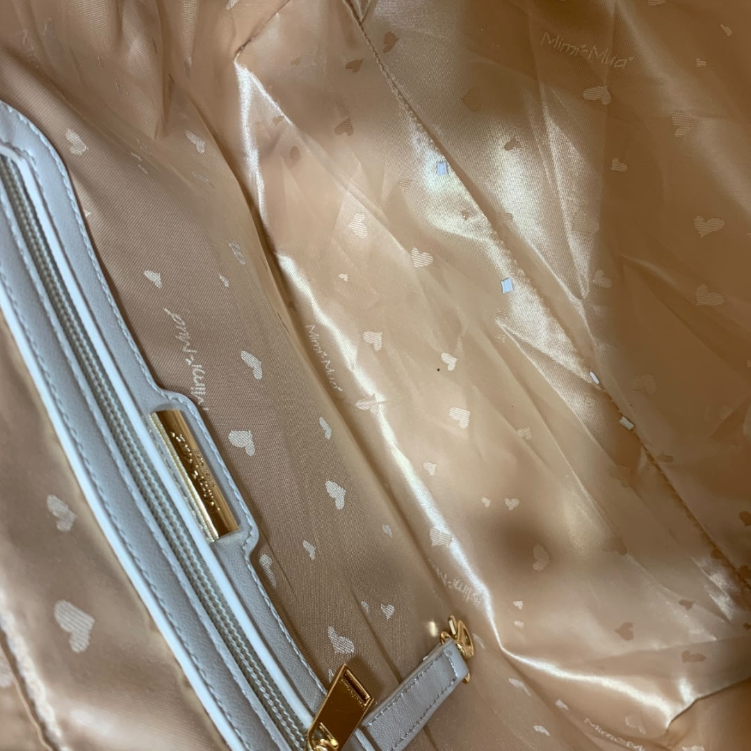 MIMI' MUA' - BORSA GRANDE TRAFORATA CON BORCHIE